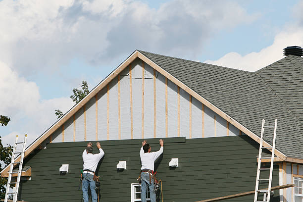 Professional Siding Installation technician working in Syria, VA